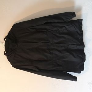 A New day Black light weight wind breaker type jacket.